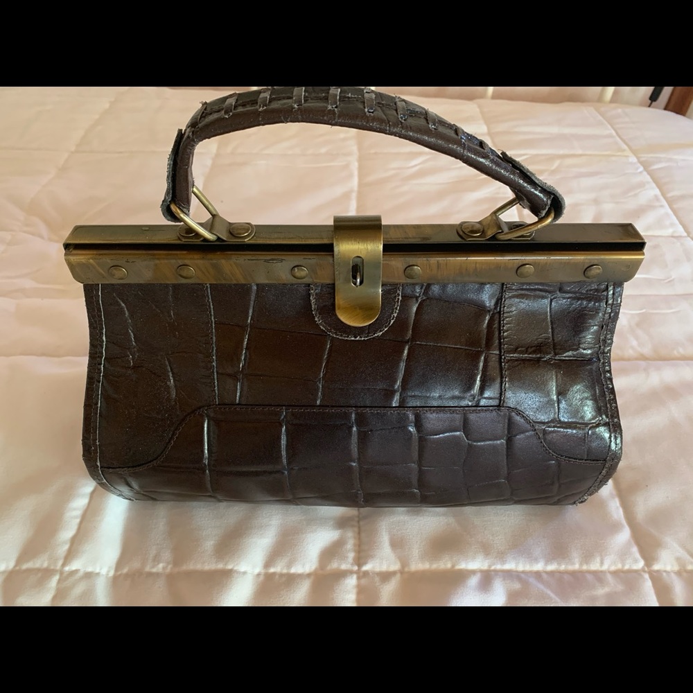 Vintage dark brown leather purse from Italy.